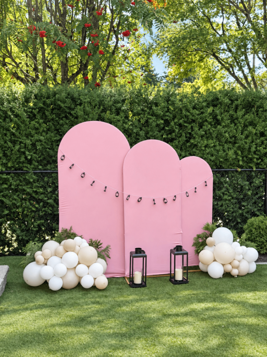 Cloud backdrop with balloon clusters and black lanterns